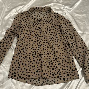 Size medium animal print button up